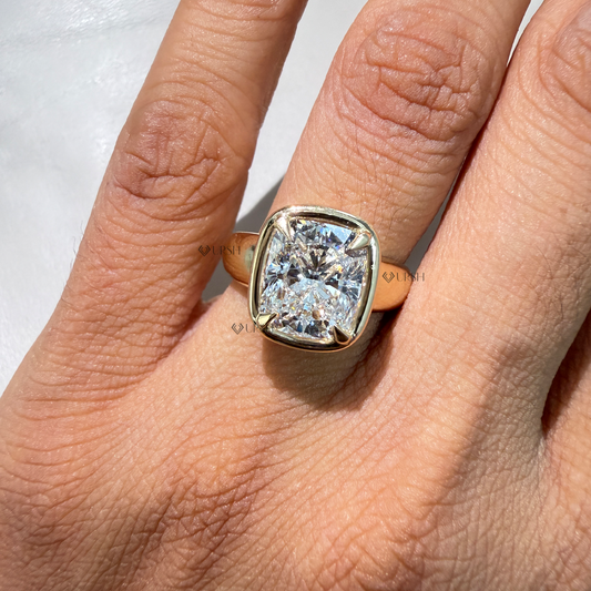 Finger placement view showing substantial finger coverage of cushion lab diamond bezel ring