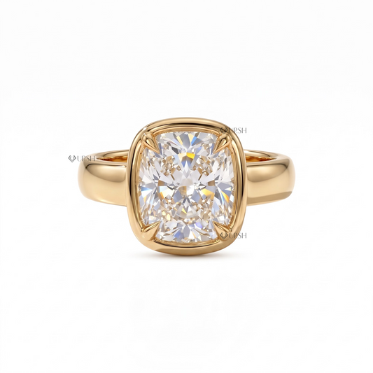Solid yellow gold chunky bezel solitaire engagement ring featuring large cushion cut lab grown diamond
