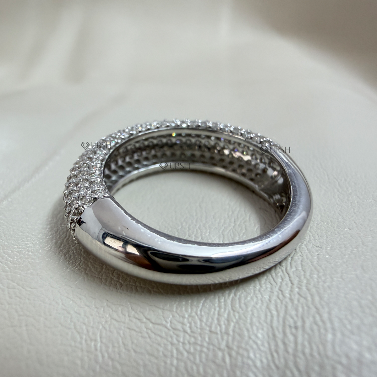 Under-finger view displaying solid gold comfort-fit inner shank and smooth back gallery