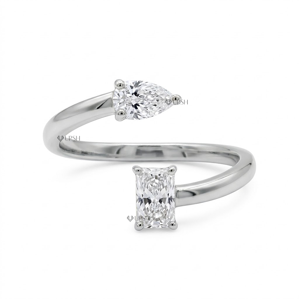 Solid white gold modern toi et moi bypass ring with prong-set pear and radiant diamonds