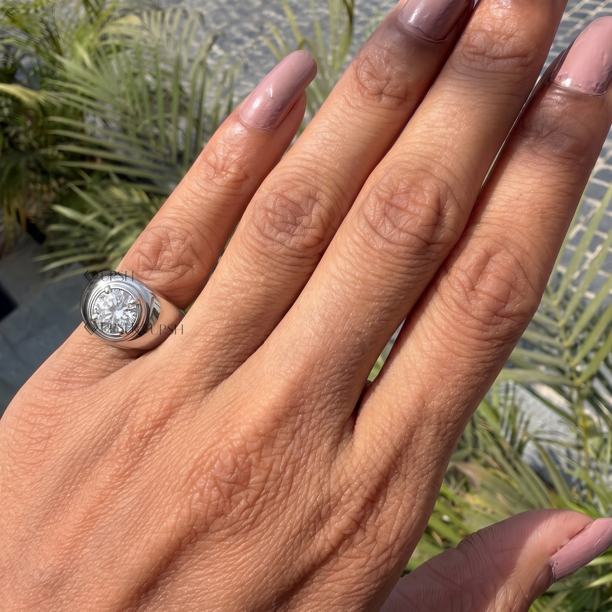 Striking chunky dome signet ring worn on hand showcasing bold architectural volume